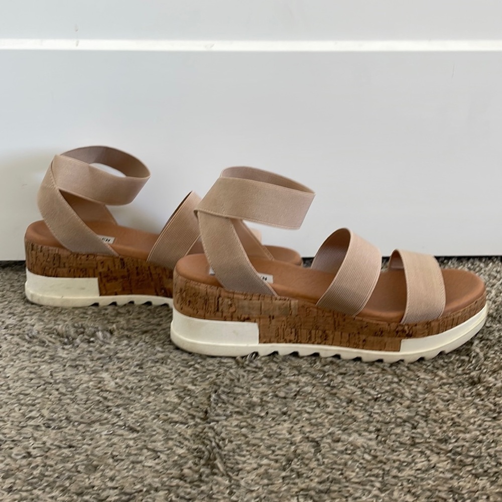 Steve Madden - ankle strap wedge sandal. They are either an 8 or 8.5 size